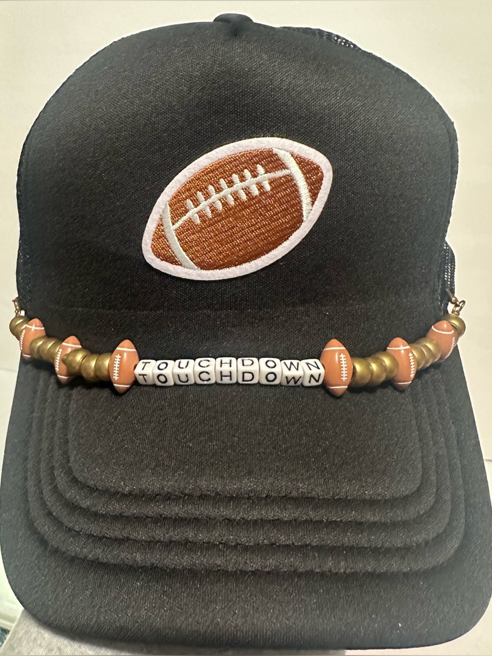 Black Trucker Hat with Football Patch and 'TOUCHDOWN' Bead Strap